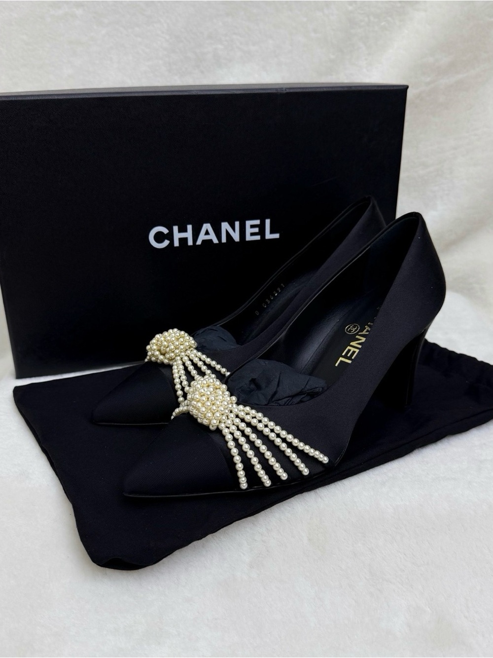 CHANEL Black Satin Pointed Pumps with Pearl Tassel Accent